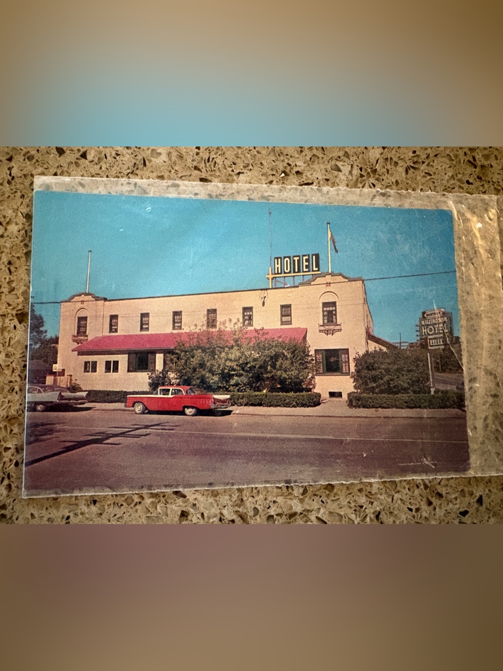 Vintage Hotel Postcard Willingdon Hotel Okotos, AB  - Blue Sky with Red Car